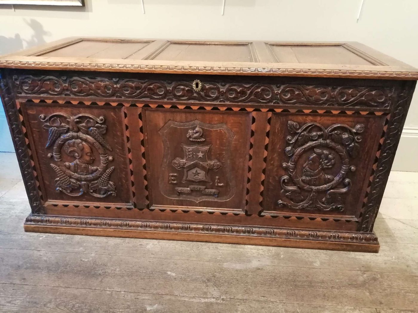 17th-century carved oak coffer with three figural medallion panels at Mere Antiques, Topsham