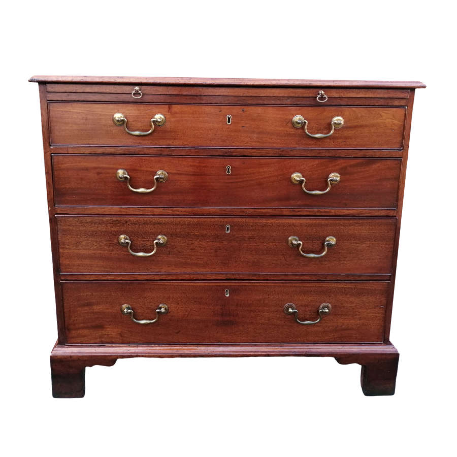Georgian mahogany chest of drawers with brushing slide and swan-neck handles at Mere Antiques, Topsham